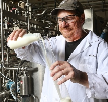 Bruce Applegate of Purdue University developed a process that could greatly extend milk's shelf life. Image credit: Purdue Agriculture Communication/Tom Campbell.