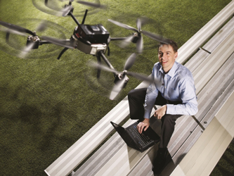 Steve Waslander, mechanical and mechatronics professor, with a quad rotor helicopter. Image source: University of Waterloo.