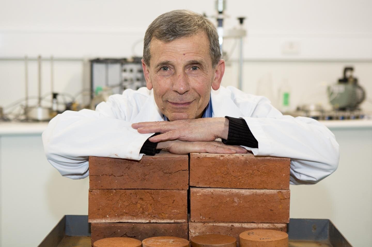 Associate professor Abbas Mohajerani with bricks made with cigarette butts. Source: RMIT University