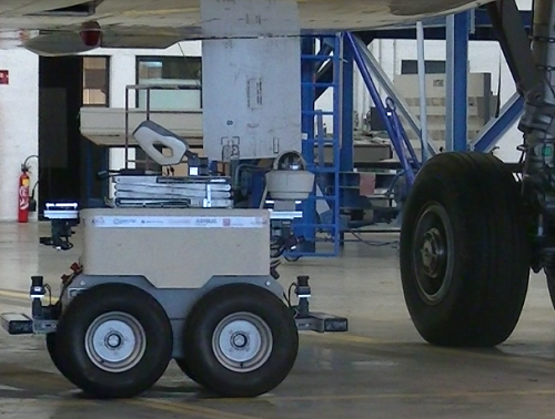 Cobot used in an airport to autonomously deliver heavy items. Source: Airbus