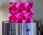 3-D-printed gyroid models such as this one were used to test the strength and mechanical properties of a new lightweight material.  Credit: Melanie Gonick/MIT