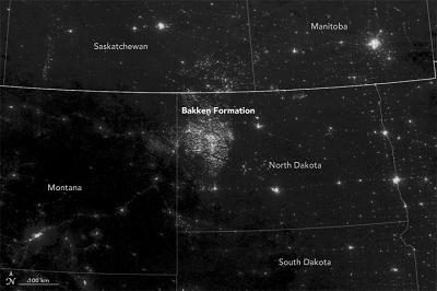 Bakken Formation methane flaring in North Dakota as seen from space. Image credit: NASA's Earth Observatory