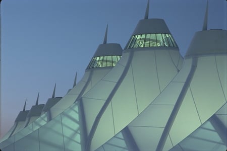 Peaked fabric roofs evoke the Rocky Mountains and early Colorado history when Native American teepees dotted the Great Plains. Image source: Denver International Airport