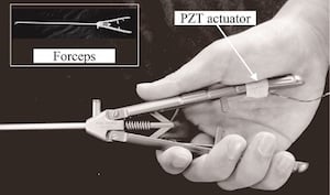 The PZT Actuator attaches to a surgical tool and vibrates in the doctor&rsquo;s palm at a constant rate. Image credit: Yuichi Kurita, Hiroshima University.