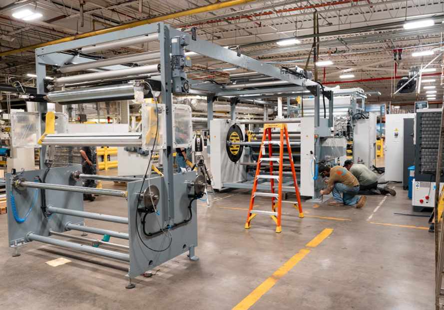 Figure 7: the machine is equipped with a large 45-inch diameter turret winder, which allows rapid roll changes and minimizes downtime between production runs. Source: Adhesive Applications