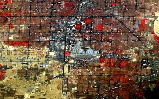 Color infrared composite image made from three spectral bands of NASA's MASTER instrument mounted on the high-altitude ER-2. Red areas depict green vegetation in Las Vegas, Nev., on May 30. 2014. Source: NASA/Dean Neeley/Jeff Myers
