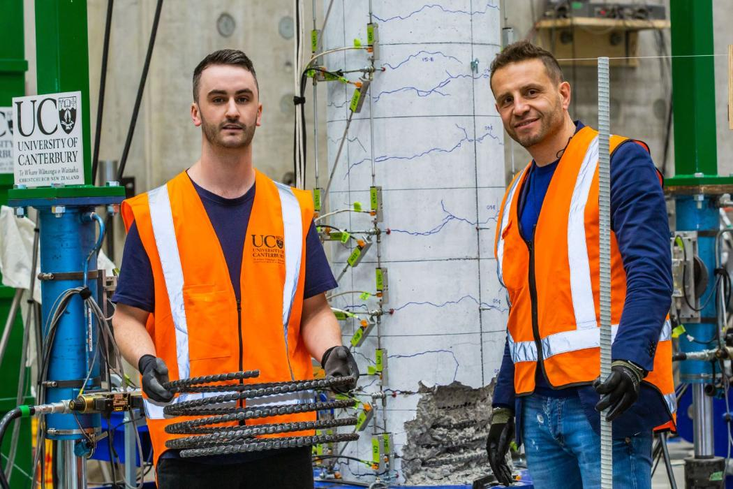 New research at UC led by structural engineering professor Alessandro Palermo (right) has highlighted the impact deterioration can have on the performance of structures. Ph.D. student Cain Stratford (left) is investigating how GFRP bars may be used in reinforced-concrete bridge columns. Source: University of Canterbury