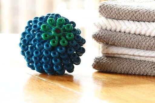 The Cora Ball is a product developed by a nonprofit group called Rozalia Project that seeks to cut down on small threads that enter waterways when people do laundry. The group says the ball could cut down on this kind of pollution by more than 25 percent. Source: Megan Bender/Cora Ball via AP