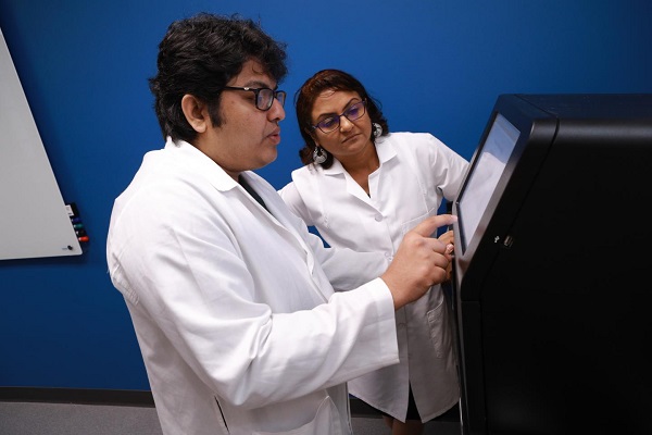 Saroj Chakraborty, a fourth-year Ph.D. student at the University of Toledo, left, and Dr. Bina Joe, Distinguished University Professor and chair of UT's Department of Physiology and Pharmacology.  Source: Dan Miller, University of Toledo