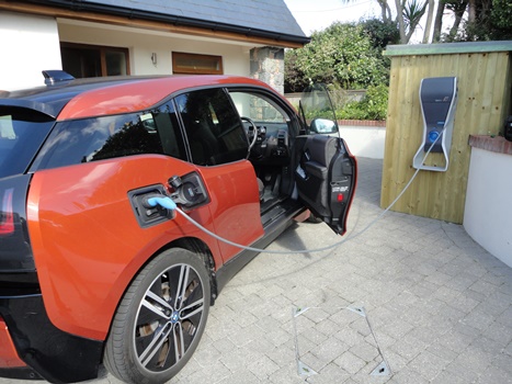 A BMW gets an AC recharge via a Schneider Electric wall box. Source: Schneider Electric