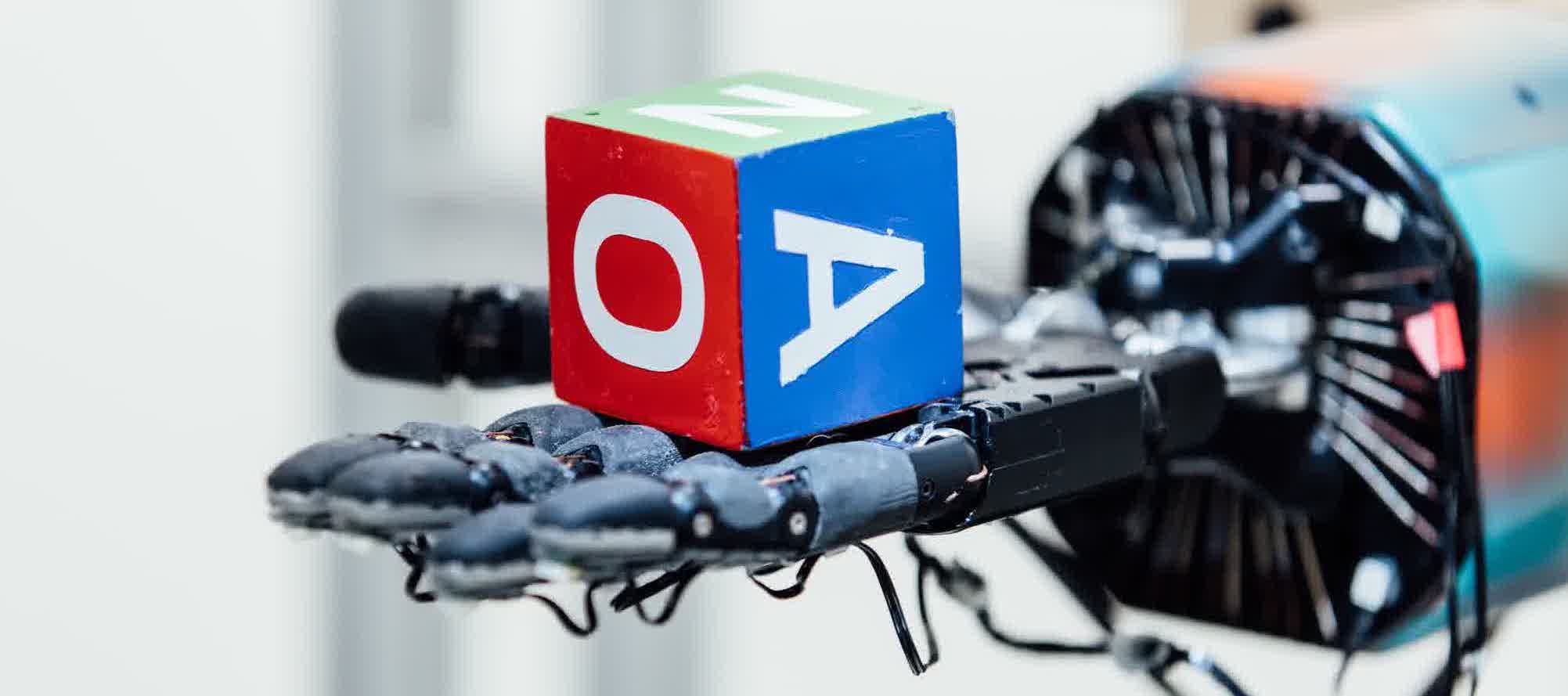 Dactyl learns to manipulate objects with human-like fidelity by training neural networks with data from a massive number of simulations. Source: OpenAI