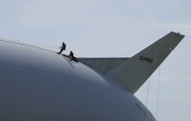 Two technicians on top of Airlander. Source: Hybrid Air Vehicles