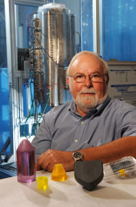 WSU&rsquo;s Kelvin Lynn with crystals made in his lab. Image source: WSU