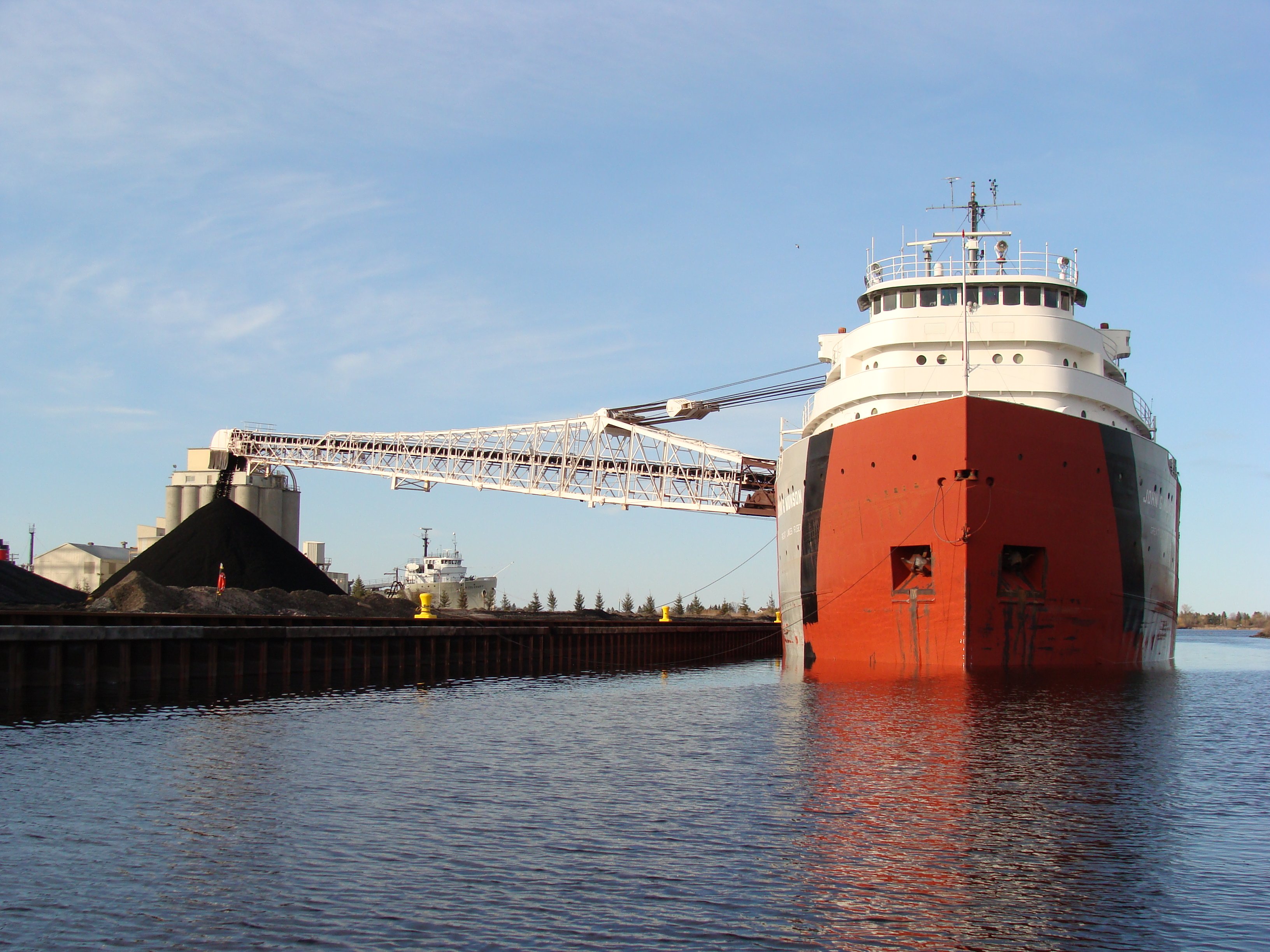 The self-dischaging dry bulk carrier John G. Munson unloads coal at a terminal in Superior, Wisconsin, on Lake Superior.