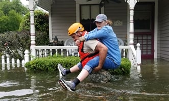 National guard troops helped evacuate residents of Houston after Hurricane Harvey.