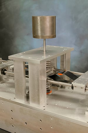 HRL Laboratories introduced negative stiffness to achieve positive results in a vibration isolator mechanism.