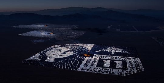 The solar power plant's heliostats were arrayed to reflect moonlight, creating the tribute to the Apollo pioneer. Source: Google
