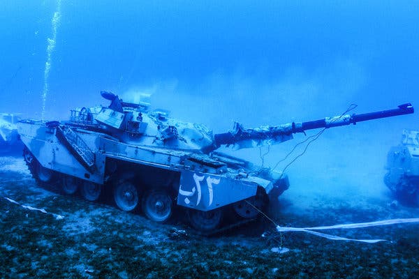 A sunken Jordanian Armed Forces battle tank on the seabed of the Red Sea off the coast of Aqaba, submerged to be part of a new underwater military museum. Source: Aqaba Special Economic Zone Authority