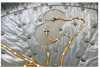 Figure 2. Closer view of Mars 2020 heatshield showing upper and lower pressure transducers as well as thermocouple conductors. Source: NASA