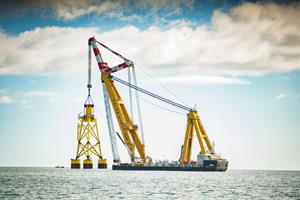 (Click to enlarge.) This 25,000-ton crane is helping to build an offshore wind farm. Source: Vatttenfall