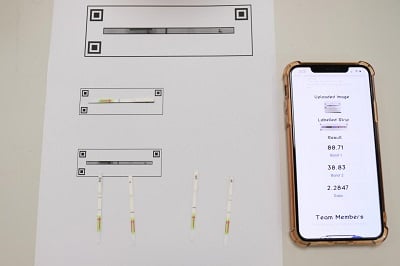 To make the test easy to administer, the assay is integrated into a specially treated paper strip and a mobile phone app facilitates interpretation of the results. Source: Nanyang Technological University