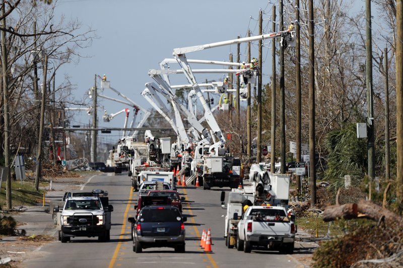 Utility infrastructure faces increased risk from climate hazards, according to a report from Moody's Investors Service. Source: AP/Gerald Herbert