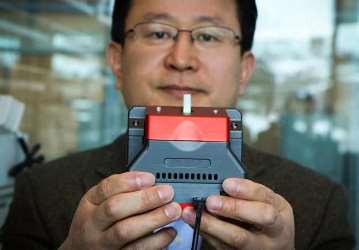 University of Utah materials science and engineering professor Ling Zang&rsquo;s handheld explosive material and toxic gas detector. Image source: Dan Hixson/University of Utah College of Engineering.