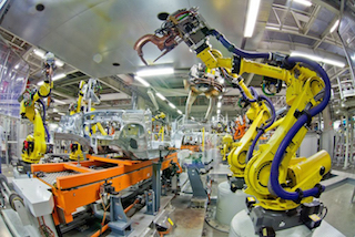 Within NAFTA, 55% of the total demand for industrial robots comes from the auto sector. Image credit: IFR.