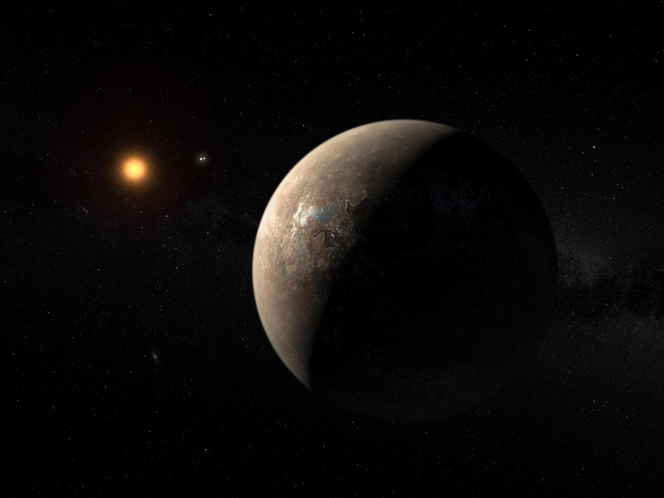 An artist's impression of the planet Proxima b orbiting the red dwarf star Proxima Centauri, the closest star to the Solar System. Credit: Nasa handout