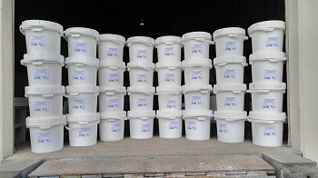 Containers of asteroid simulant are stacked up and ready for delivery to NASA. (Source: Deep Space Industries)