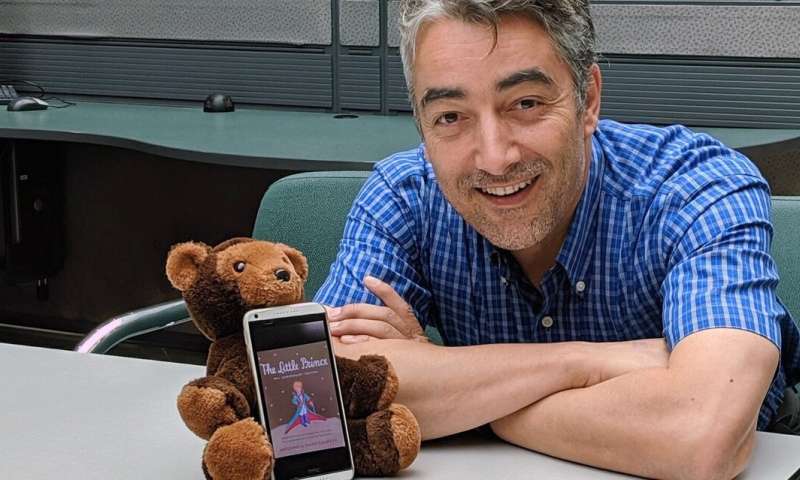 University of Alberta computer scientist Osmar Zaïane with the chatbot he and his team are developing that can express and respond to emotions. Source: Melanie Marvin