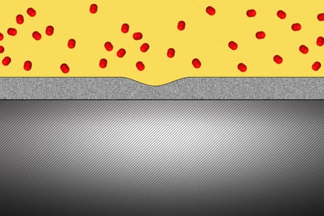 Researchers have found that a solid oxide protective coating for metals can, when applied in sufficiently thin layers, deform as if it were a liquid, filling any cracks and gaps as they form. (Source:  Christine Daniloff/MIT)
