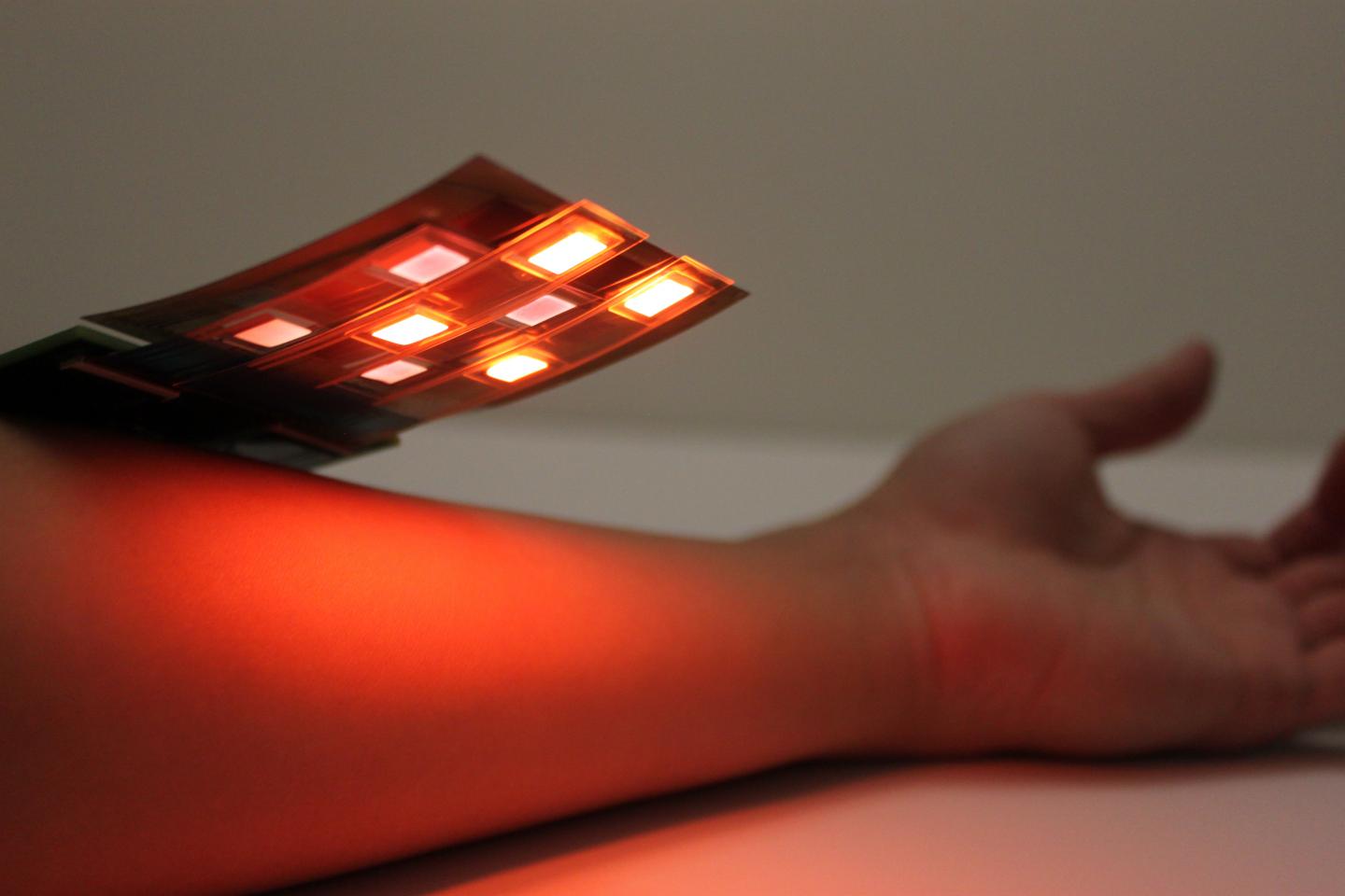 A new sensor made of an alternating array of printed LEDs and photodetectors can detect blood-oxygen levels anywhere in the body. The sensor shines red and infrared light into the skin and detects the ratio of light that is reflected back. Source: Yasser Khan, Arias Research Group, UC Berkeley