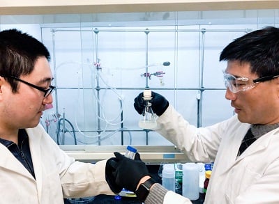 Researchers examine a sample of the newly-developed hydrogel. Source: University of Texas at Austin