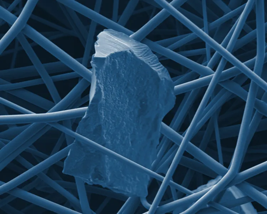Particulate captured in Alpha-Web fine fibers. Source: Donaldson Filtration Solutions