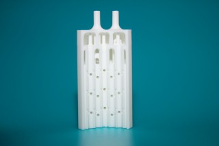 This ceramic microreactor was manufactured additively.  Image source: Fraunhofer.