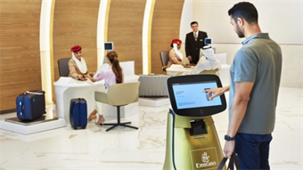 Sara, the Emirates robot, checks travelers into flights