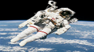 Astronaut Bruce McCandless II, STS-41B mission specialist, uses his hands to control his movement above the Earth, and just few meters away from the space shuttle Challenger, during the first-ever spacewalk without tethers and umbilicals. Source: NASA