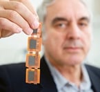Vladimir Krstic holds the daisy-chained ceramic-based capacitators. Image source: UltraCap Ltd.