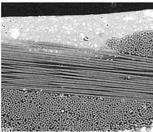 Figure 8 - Nanostructured polymer silicate nanocomposite material with improved thermal, mechanical, and barrier properties. (Image courtesy of NASA)