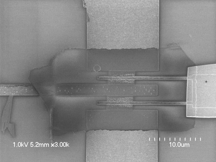 Figure 1 - Transistor with 1 atom thick graphene. A high resolution image of a graphene transistor with a sheet of carbon only one atom thick. This high speed electronic device was created using  nanoscale processes, and may one day be used for better computer chips.  (Courtesy of James Yardley, Columbia University Nanocenter, an NNI-sponsored NSEC)
