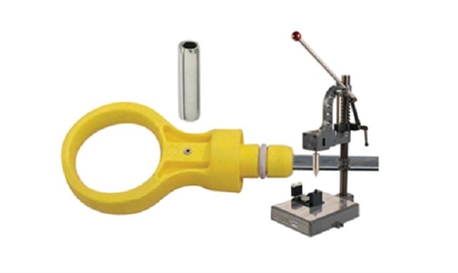Figure 7: A light duty coiled pin retains the plastic ring to the metal rod of an automotive dip stick. These pins can be easily installed with Spirol’s Model PM Manual Pin Inserter. Source: Spirol