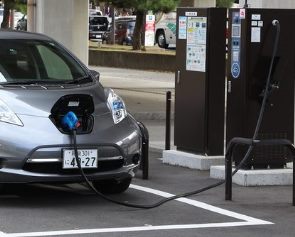 A Nissan Leaf at a charging station.