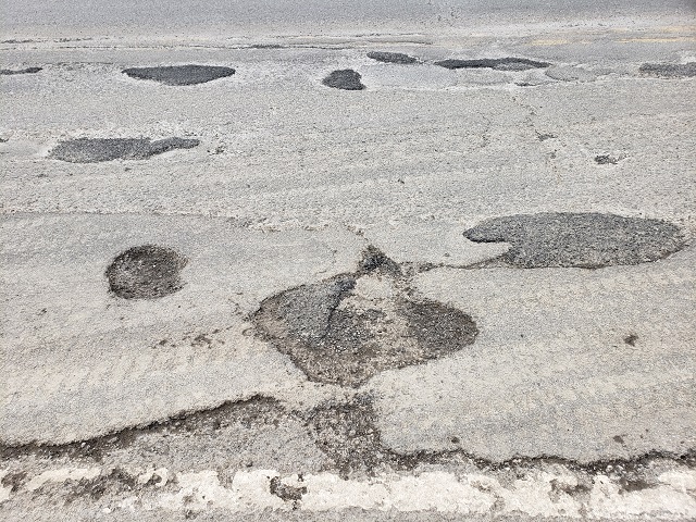 Repaired and new potholes on New York State Route 22 in Columbia County, March 28, 2019. Image source: Author