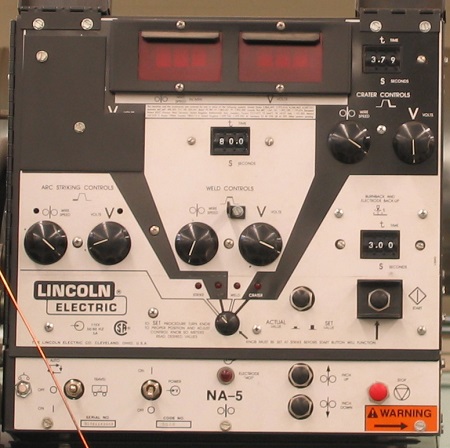 Figure 2. This older submerged arc welder has digital readouts but is controlled by knobs and switches. Fully digital, modern welding controls replace these with touchpads, granting a greater degree of control.