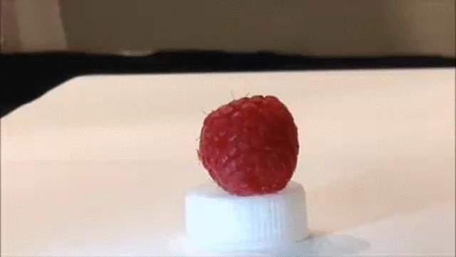 Stanford researchers developed a skin-like sensor on the fingertip of a robotic hand, and programmed it to touch the fruit without damage. Source: Courtesy of the Bao Lab