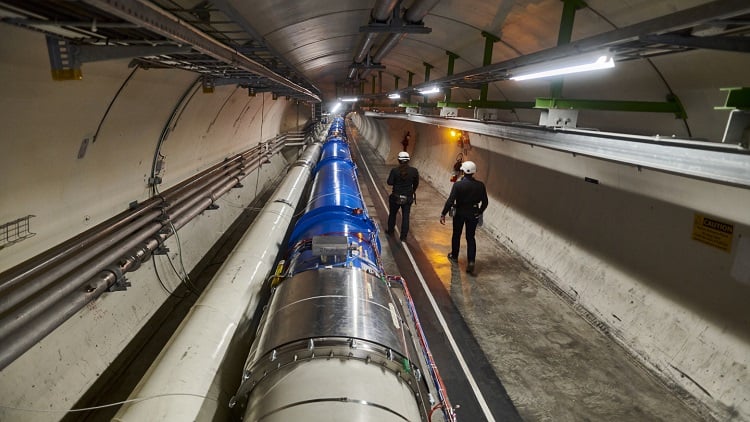 A chain of LHC dipole magnets inside the tunnel. Source: CERN