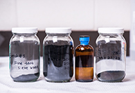 These jars show variations of the liquid polymer that looks like water and has the same density and viscosity as water. Image credit: Gurpreet Singh/Kansas State University