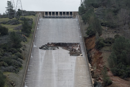 Photo from February 2017 showing damage to the dam's spillway. Source: California DWR