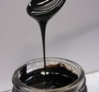Biocrude oil looks and performs similarly to fossil petroleum. Image source: Water Environment and Reuse Foundation